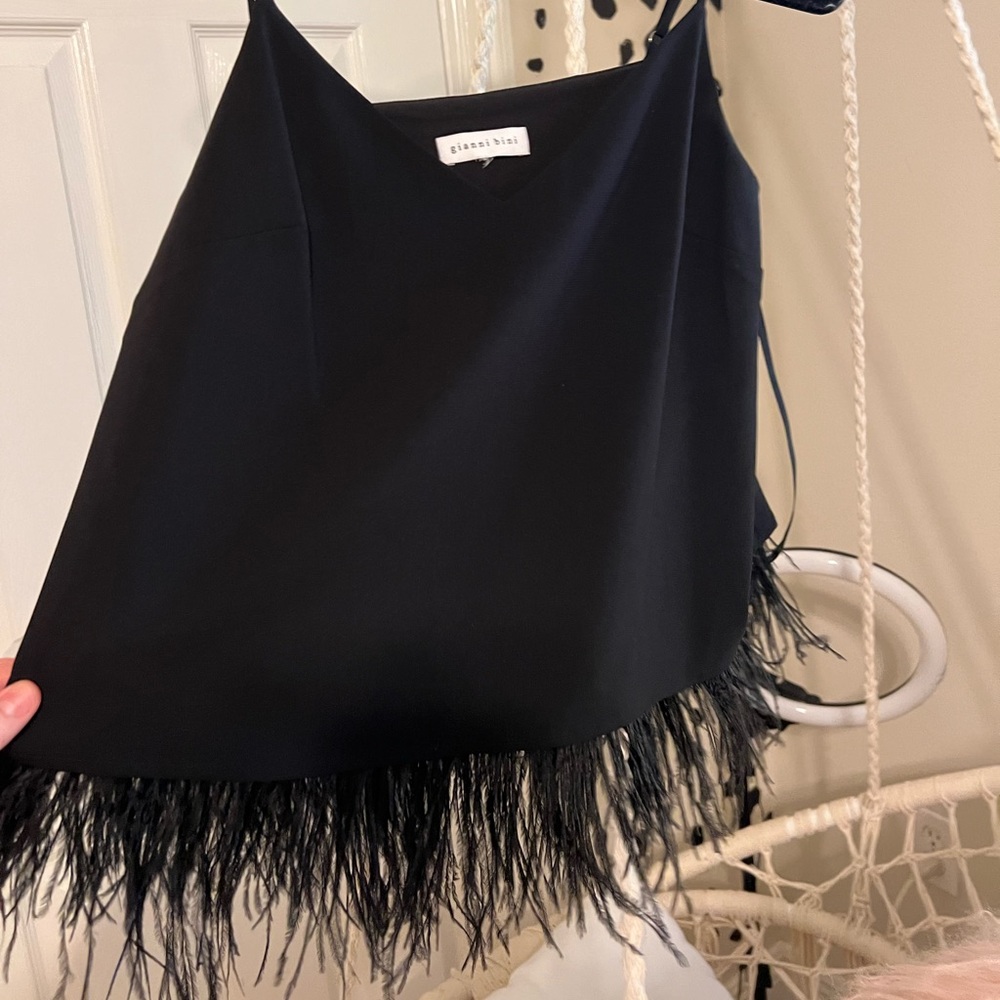 Never worn feather tank!